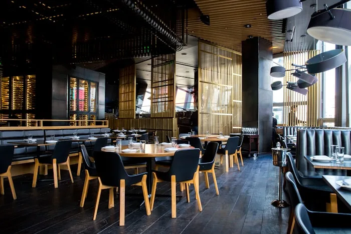 Cozy restaurant interior with set tables